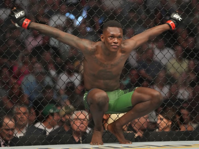 Israel Adesanya reacts before a bout against Jared Cannonier during UFC 276 at T-Mobile Arena.